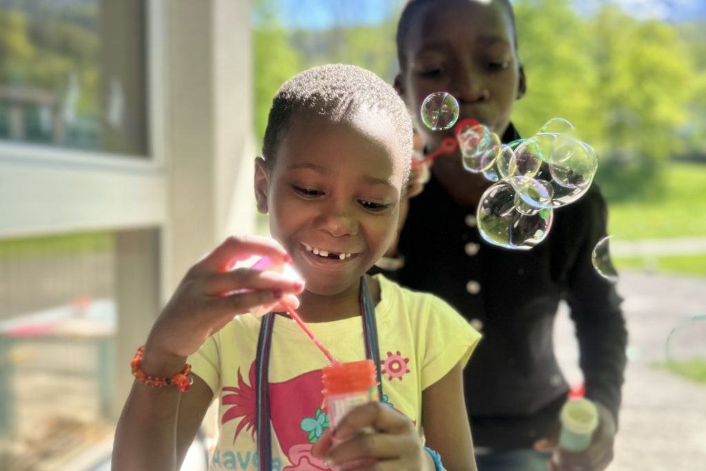 Jolie trains the muscles involved in speech and swallowing through playful exercises such as blowing soap bubbles.